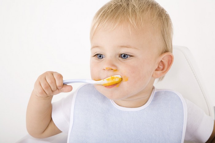 Messy baby eating