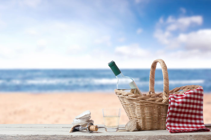 Picnic for one Person with White Wine at the Sea